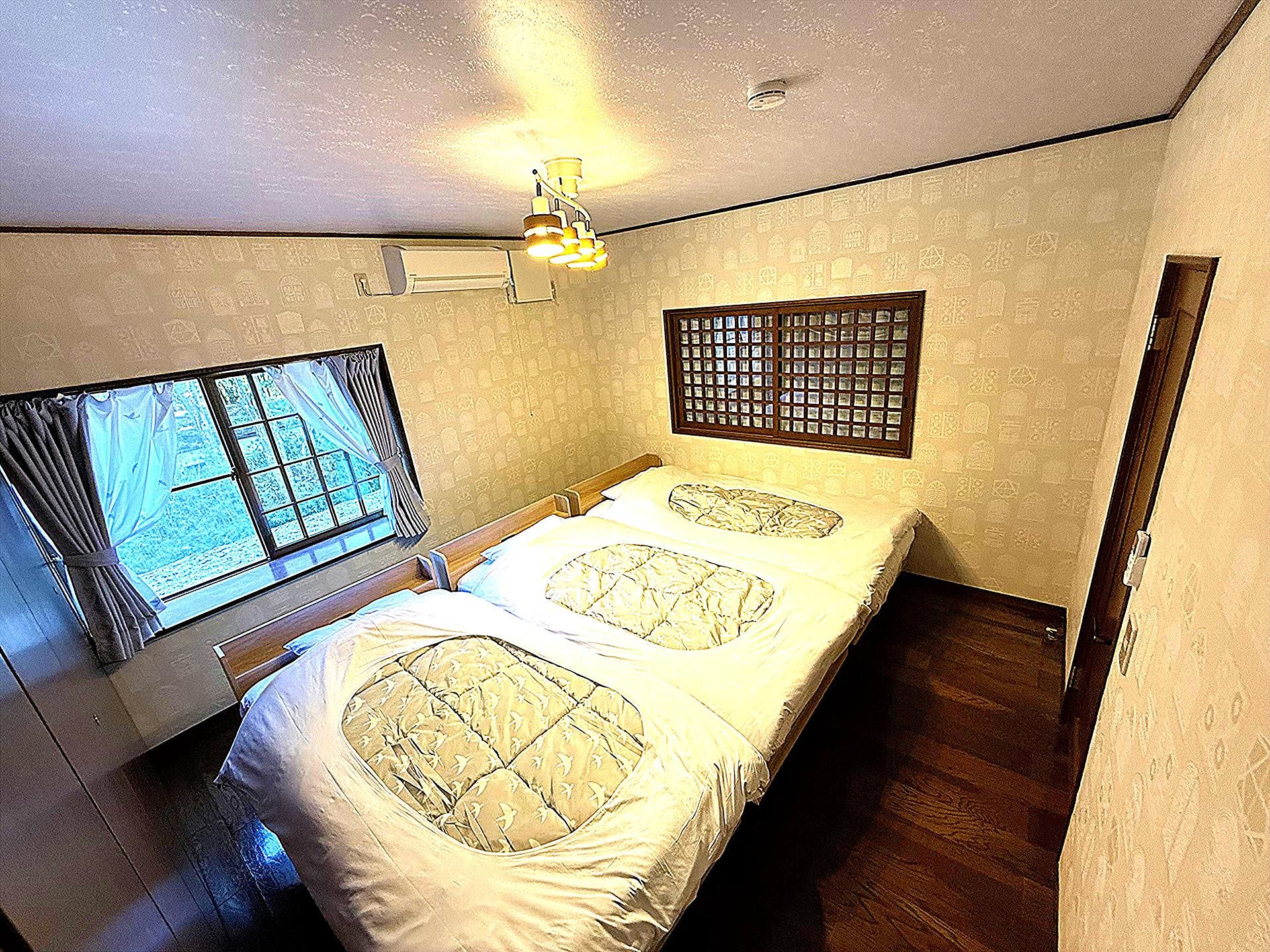 2F　壁・天井は蓄光クロスで星降る空間の寝室A