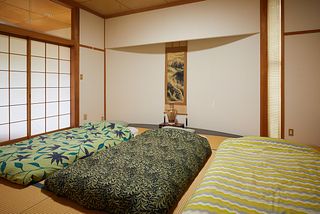 和室の掛け軸とお布団